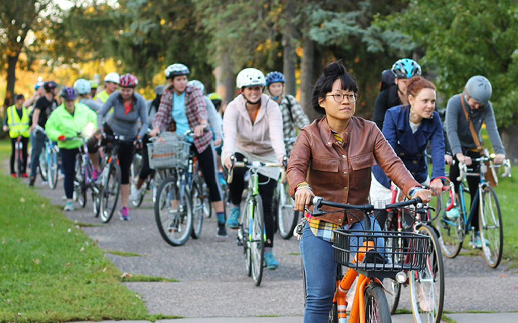 People biking on a slow roll