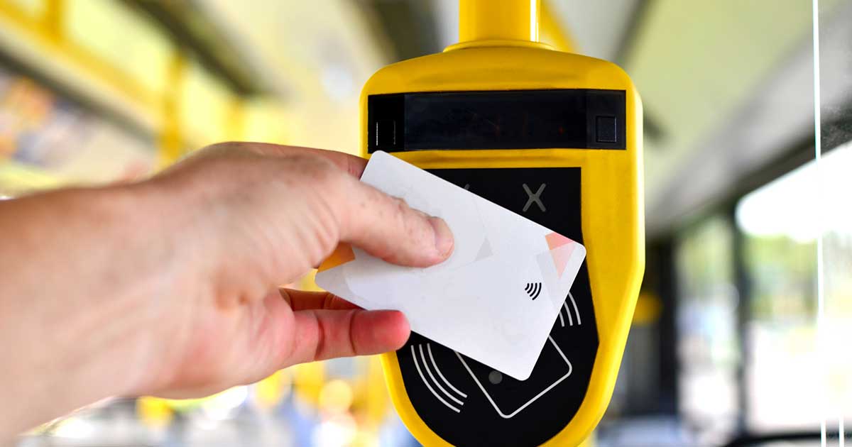 Bus rider paying for their fare