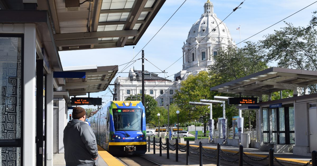 Green line train approaching Rice Street platform in Saint Paul