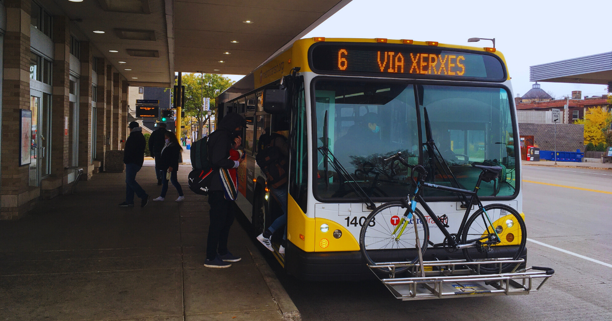 Transit rider boarding the Bus Route 6 in Minneapolis