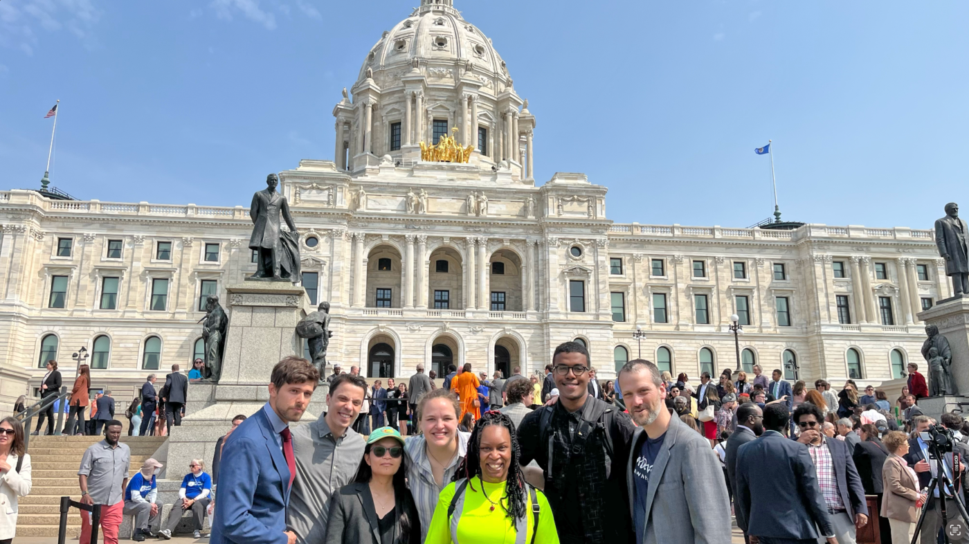 Move Minnesota staff and allies outside the Minnesota State Capitol building.