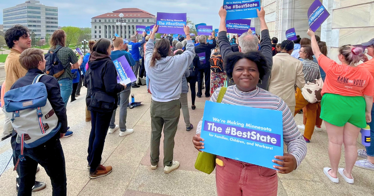 Former Move Minnesota intern Grace Bassekle at a We Make Minnesota rally in 2023