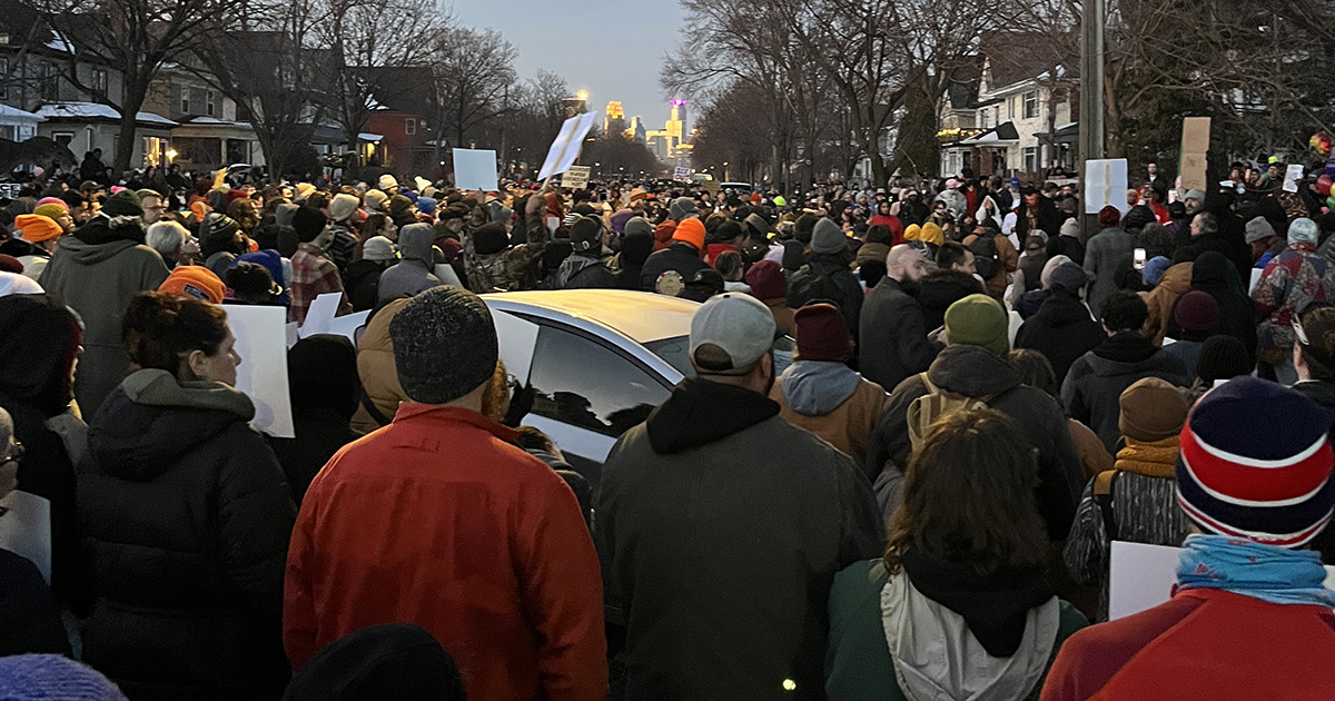 Community members in Minneapolis gather for a vigil mourning Renee Nicole Good.