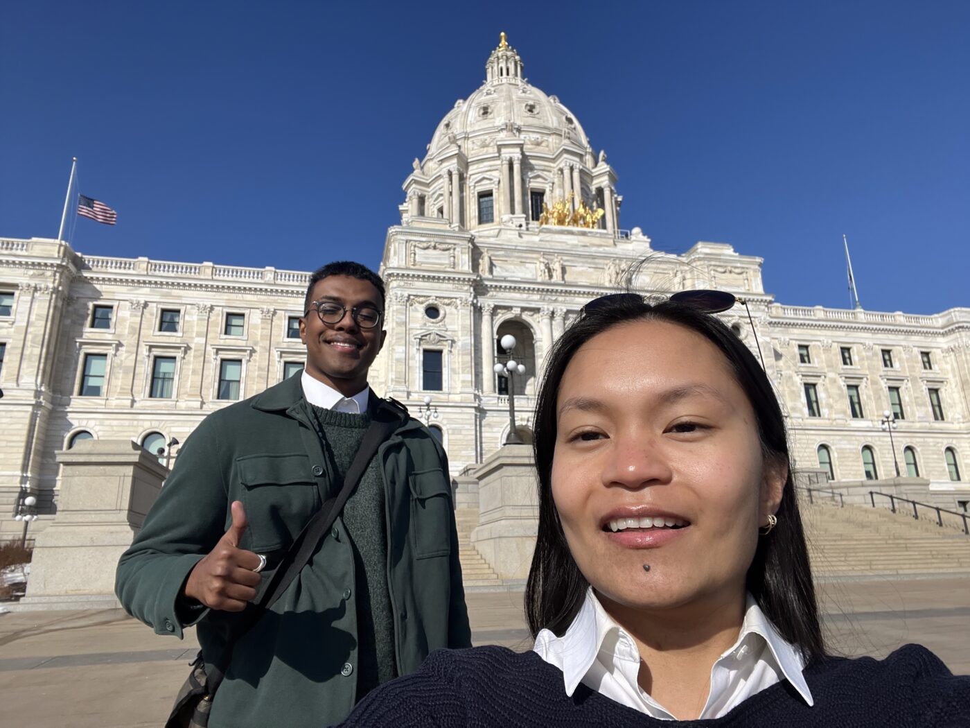 Move Minnesota staff in front of the Minnesota capitol