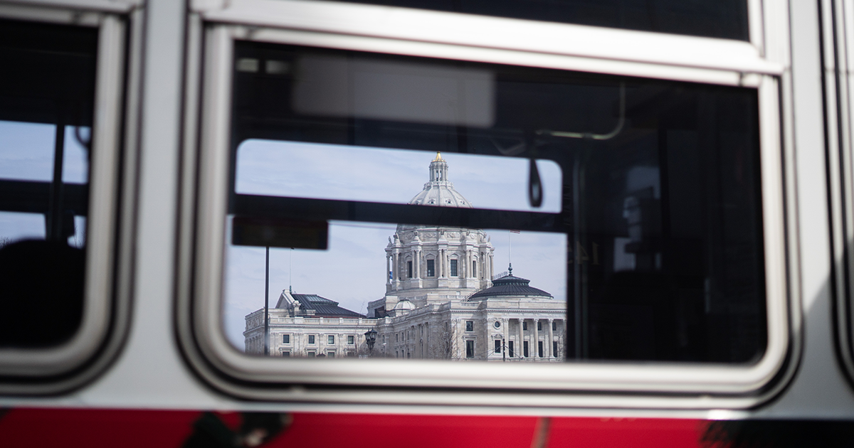 View of State Capitol through a bus window